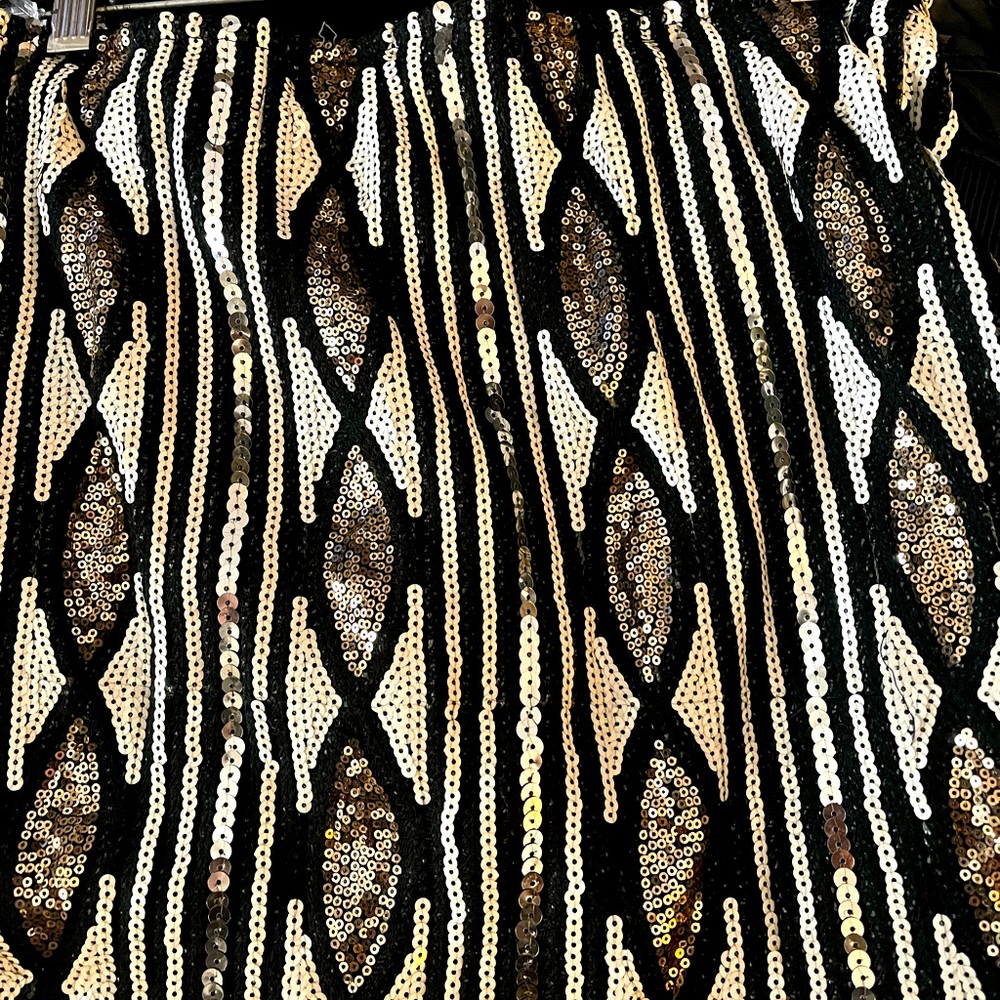 Sequined mini shirt. Stretch waist. Like new.